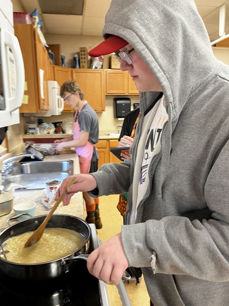 A student continuously stirs their caramel.
