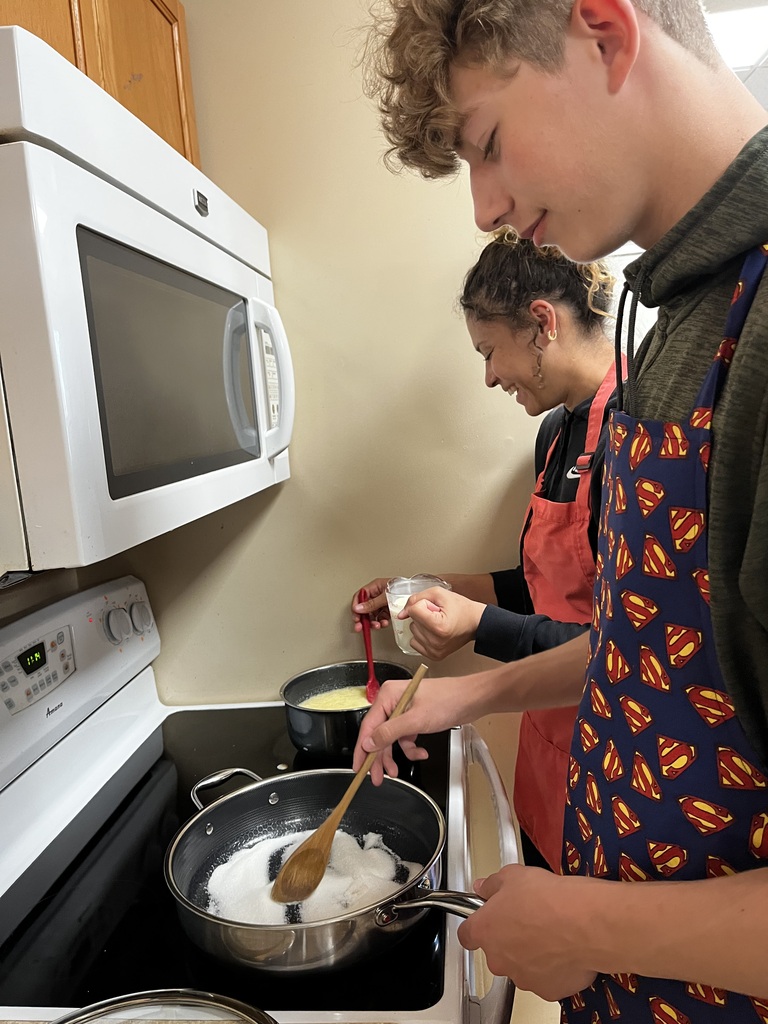 Students preparing caramel syrup and soft caramel candies. 