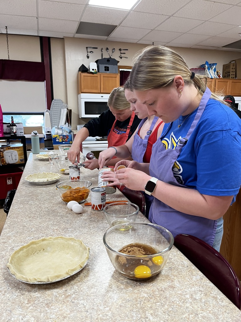 Students prepare the filling for their pie. 