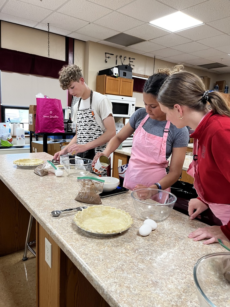 Students prepare the filling for their pie. 