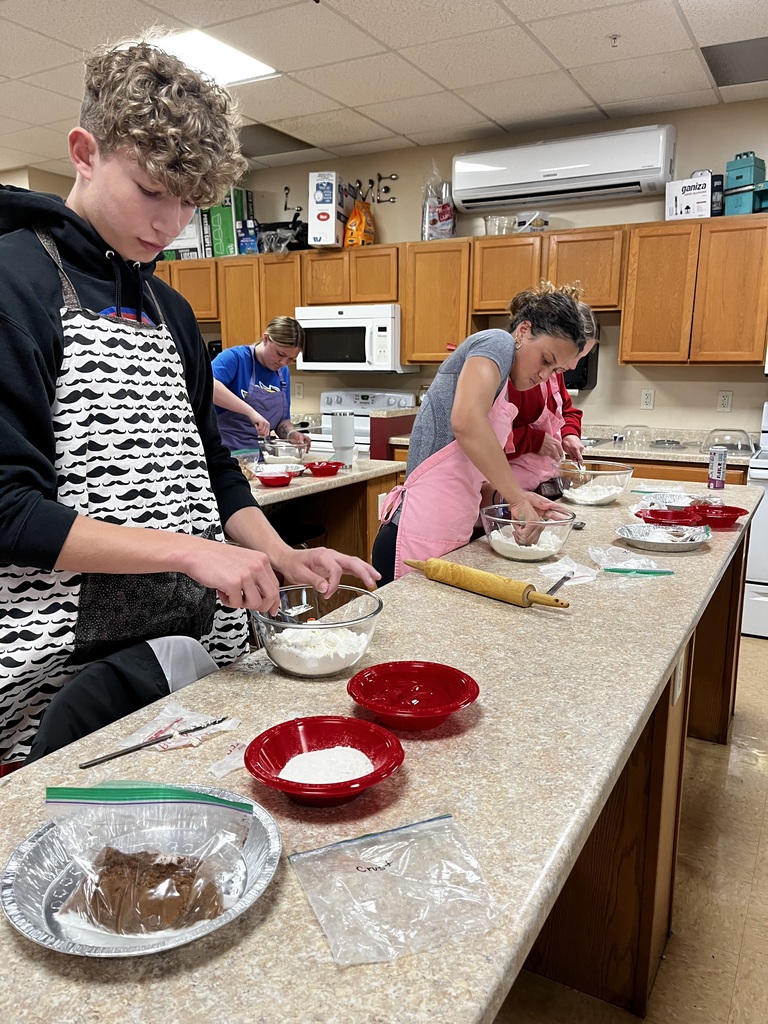 Students preparing their pie crust. 