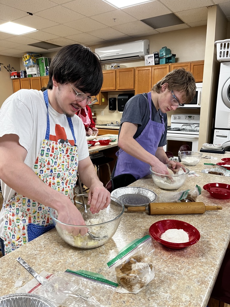 Students preparing their pie crust. 