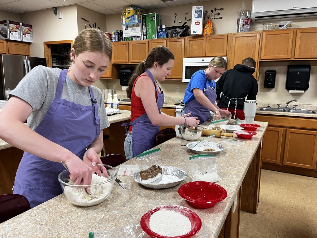 Students preparing their pie crust. 