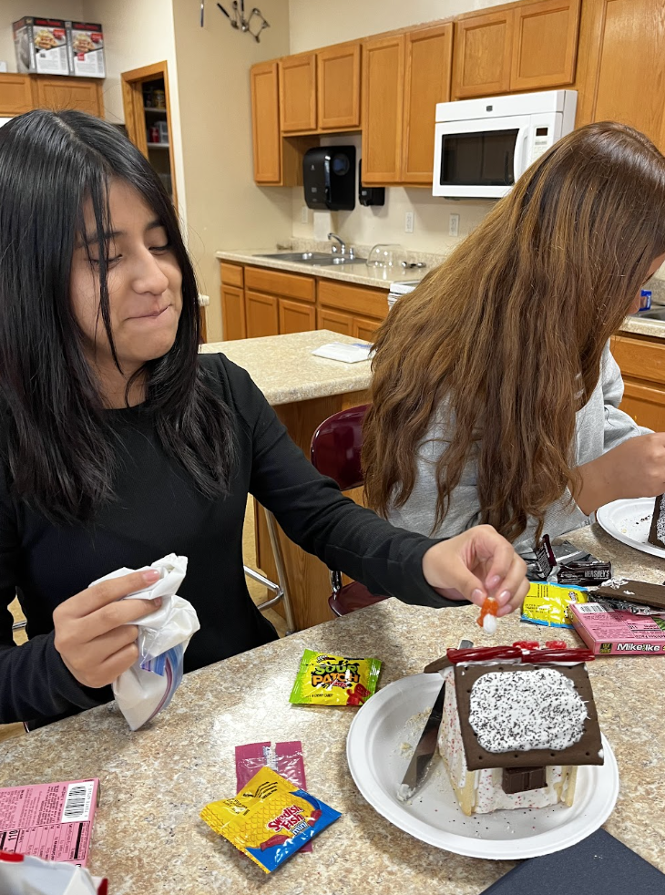 Students build and decorate Poptart houses.