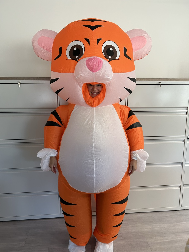 principal in a tiger costume