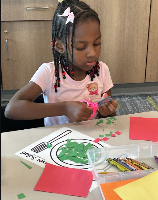 Kindergarteners making "scissor salad"