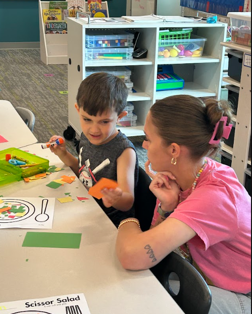 Kindergarteners making "scissor salad"