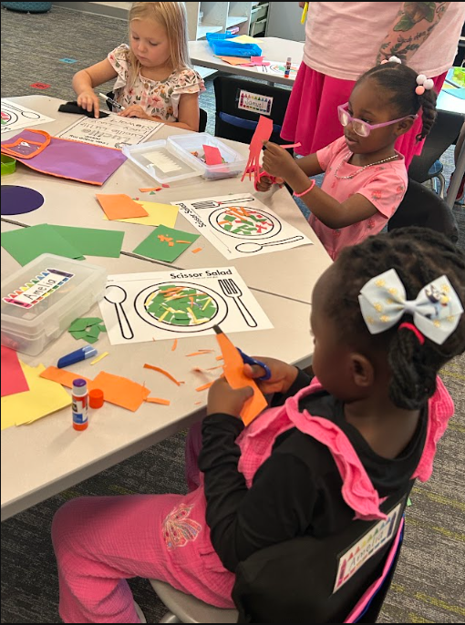Kindergarteners making "scissor salad"