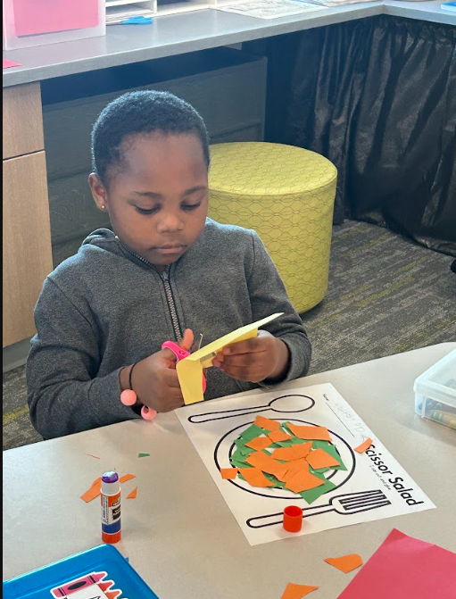 Kindergarteners making "scissor salad"