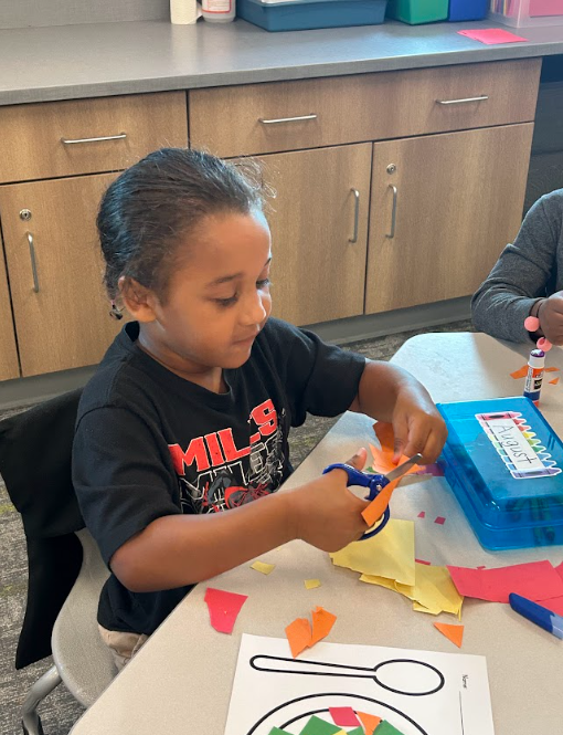 Kindergarteners making "scissor salad"