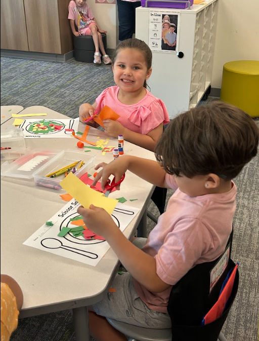 Kindergarteners making "scissor salad"