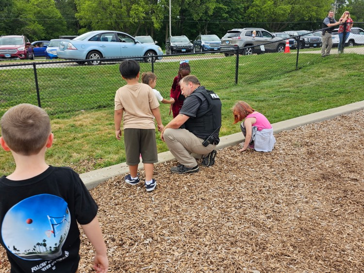 police officers have fun at recess