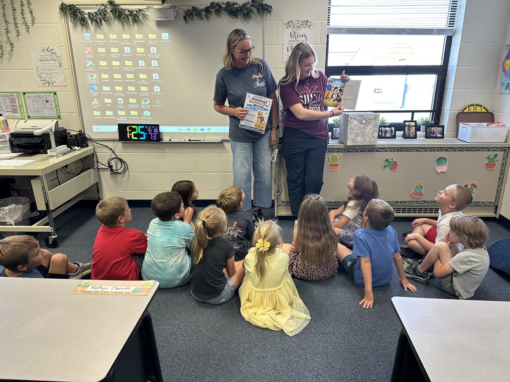 In recognition of National Service Dog Month, Mrs. Jackie Rexing, SEL Specialist and YWC advisor, and McKenna, a junior and YWC member, visited the Elementary classrooms to read to the students and teach them about service dogs. 🐾 Students learned how specially trained service dogs assist people with physical, medical, and emotional needs, helping them feel safer and live more independently. Thank you, McKenna, for helping us spread awareness! 💙