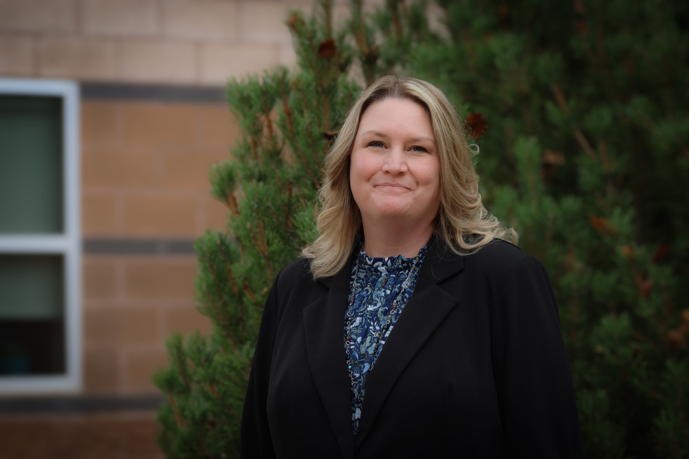 woman standing in front of tree