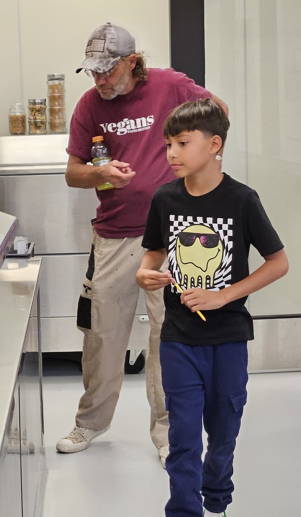boy and man getting food