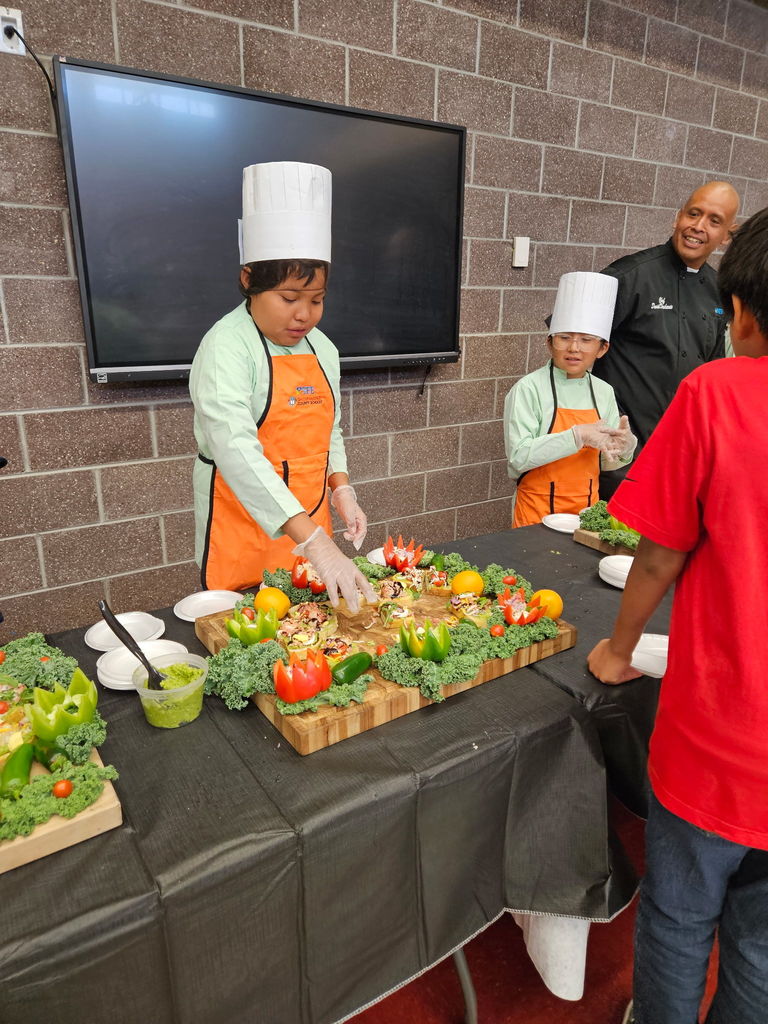 student serving food