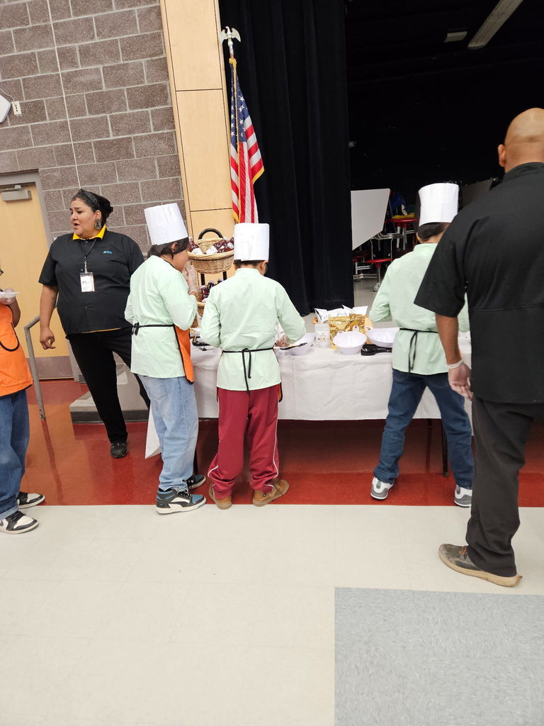 roving chefs serving themselves some of their creations
