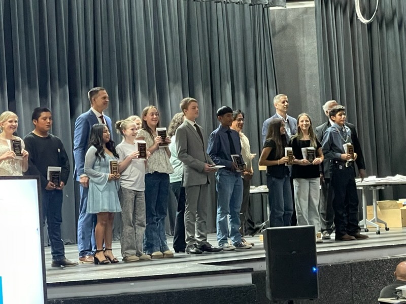 Ramah Students onstage with Mr. Gibbons and Mr. Hyatt.