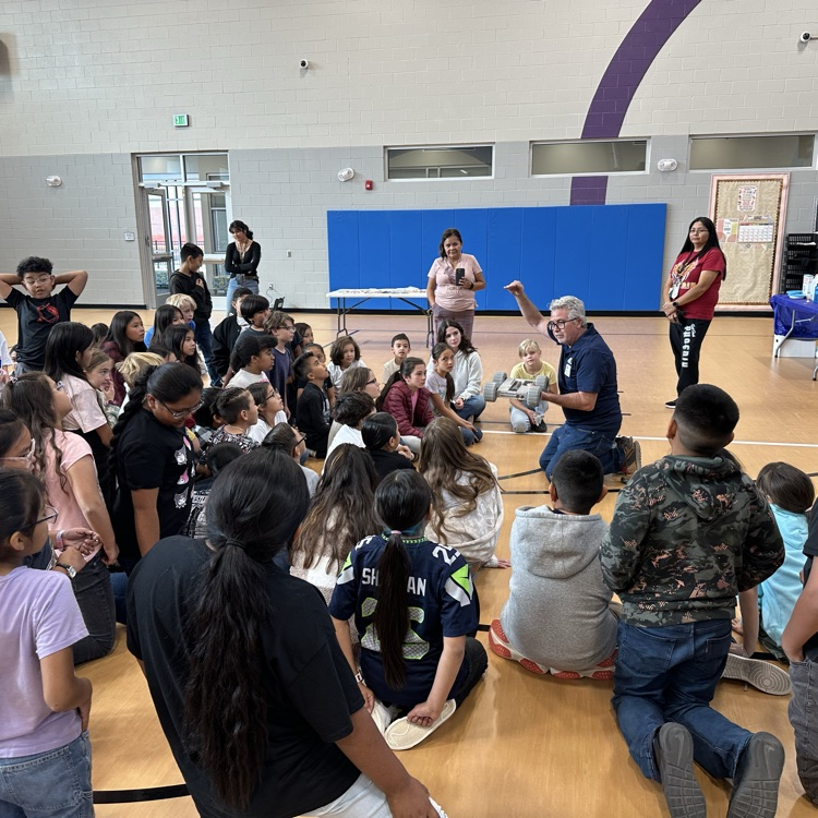 robot being presented to many students