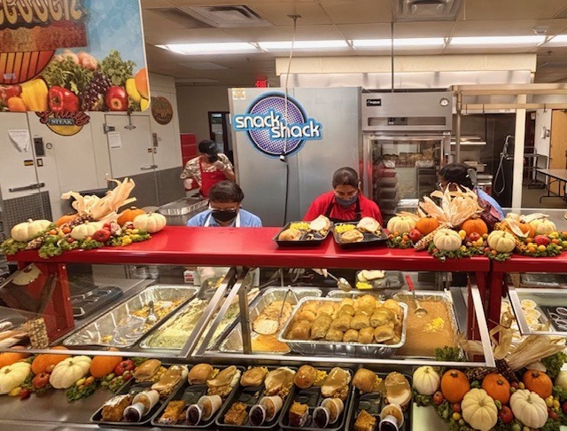 Staff serving the Thanksgiving meal