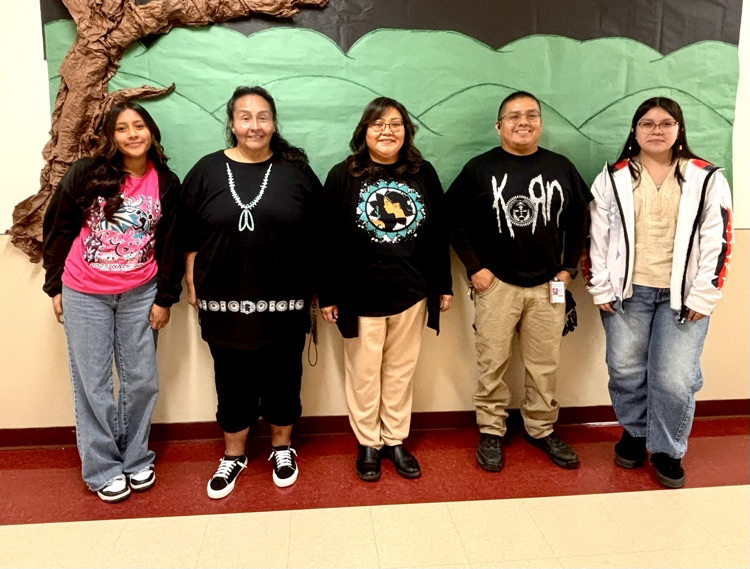 Staff and Students with T-shirts showing Native Designs.