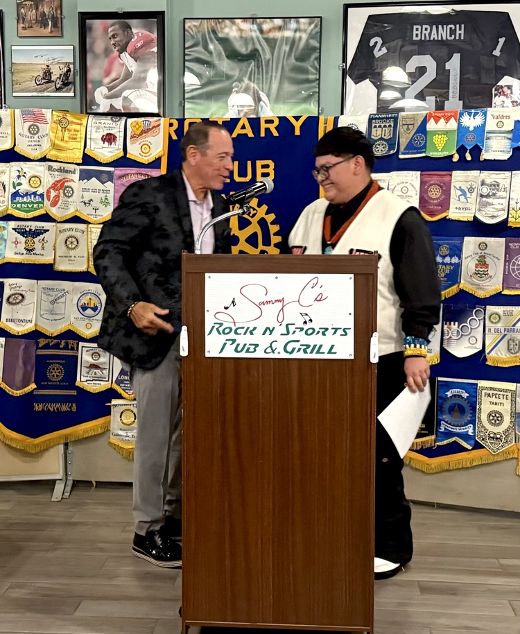 Elyn accepting his award