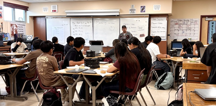 Kyle Briggs talking to the Sophomores about a company’s brand