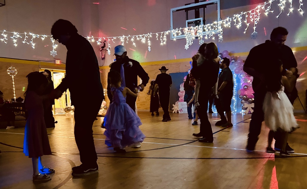 dancing at Bows and Ties event