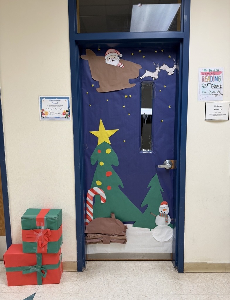 Mr. Brossy's door has Santa in a sleigh, a snowman, and a hogan