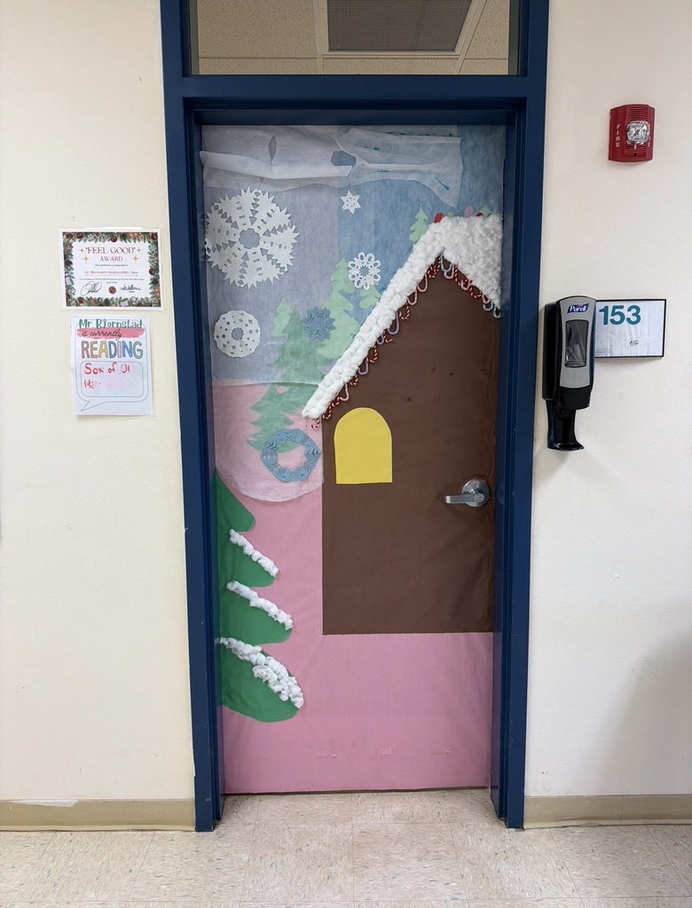 Mr. Bjornstad's door features a gingerbread house with a tree and snowflakes.