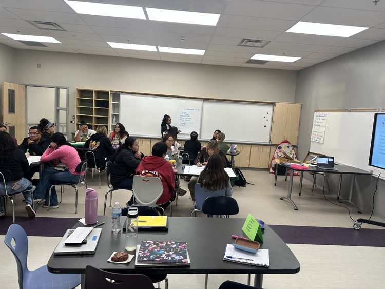 teachers having discussions in PLCs