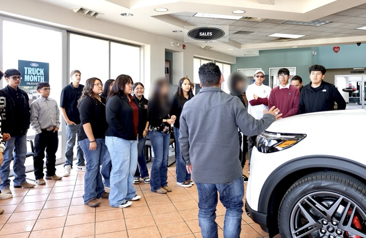 Ramah 10th Graders visiting car dealership in Gallup.