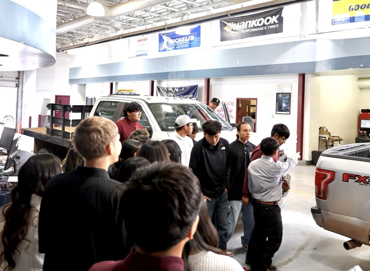 Ramah 10th Graders visiting car dealership in Gallup.