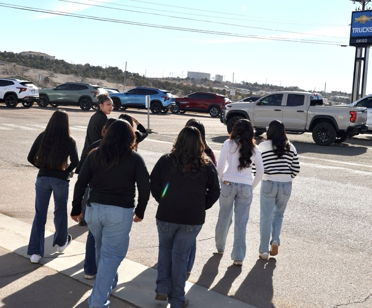 Ramah 10th Graders visiting car dealership in Gallup.