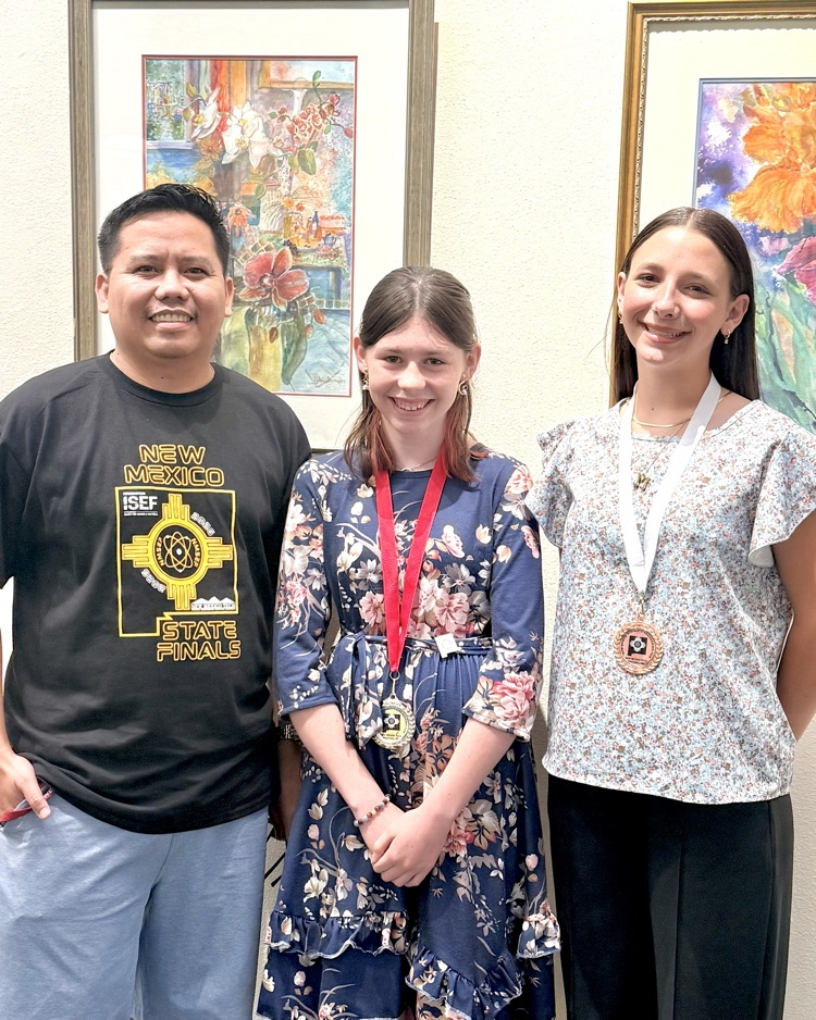 Mr. Geolin, Niyah Lambson, and Marion Grassie