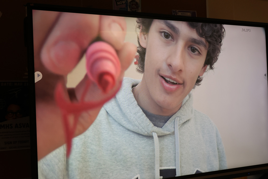 person draws on a screen