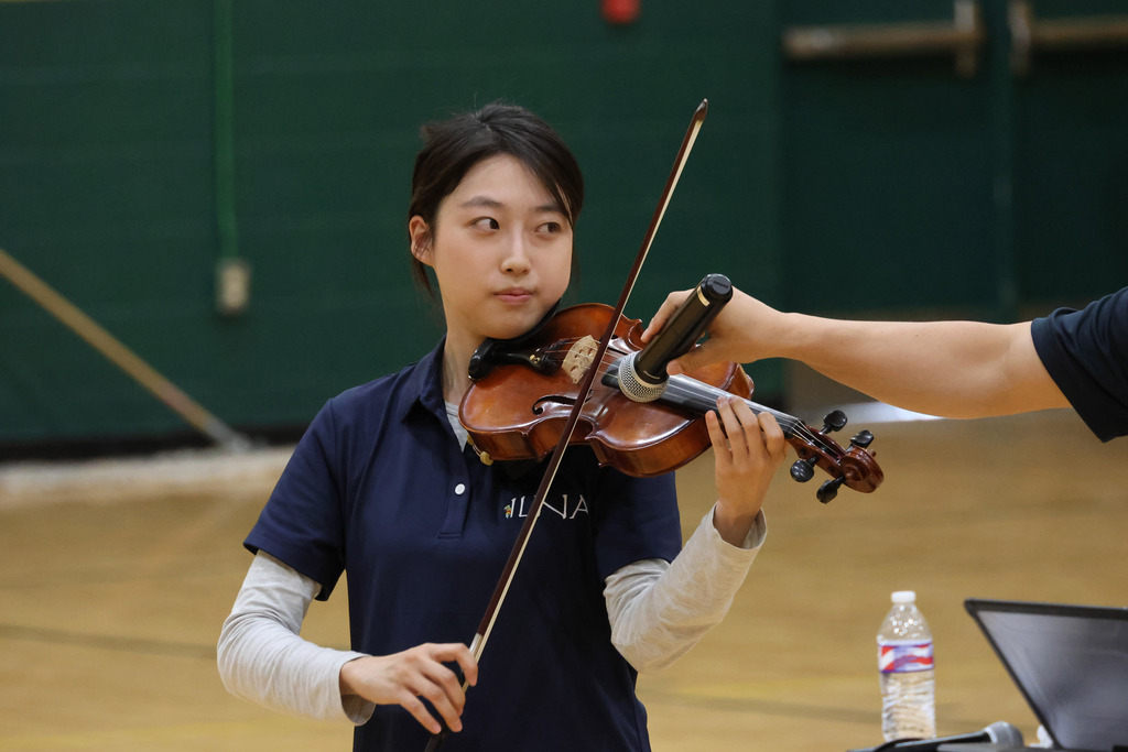 someone playing violin