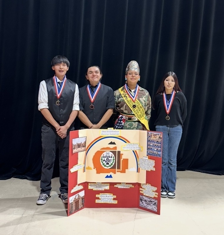 black background, students, trifold project