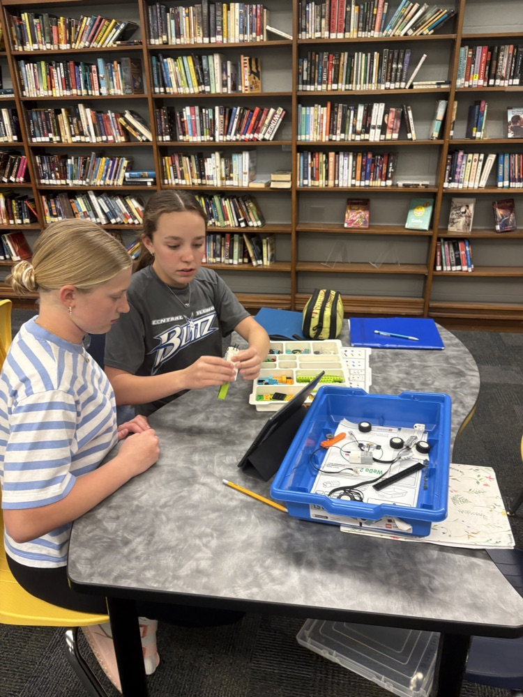 students coding with legos