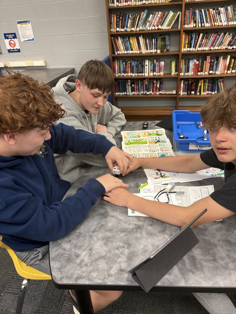 students coding with legos