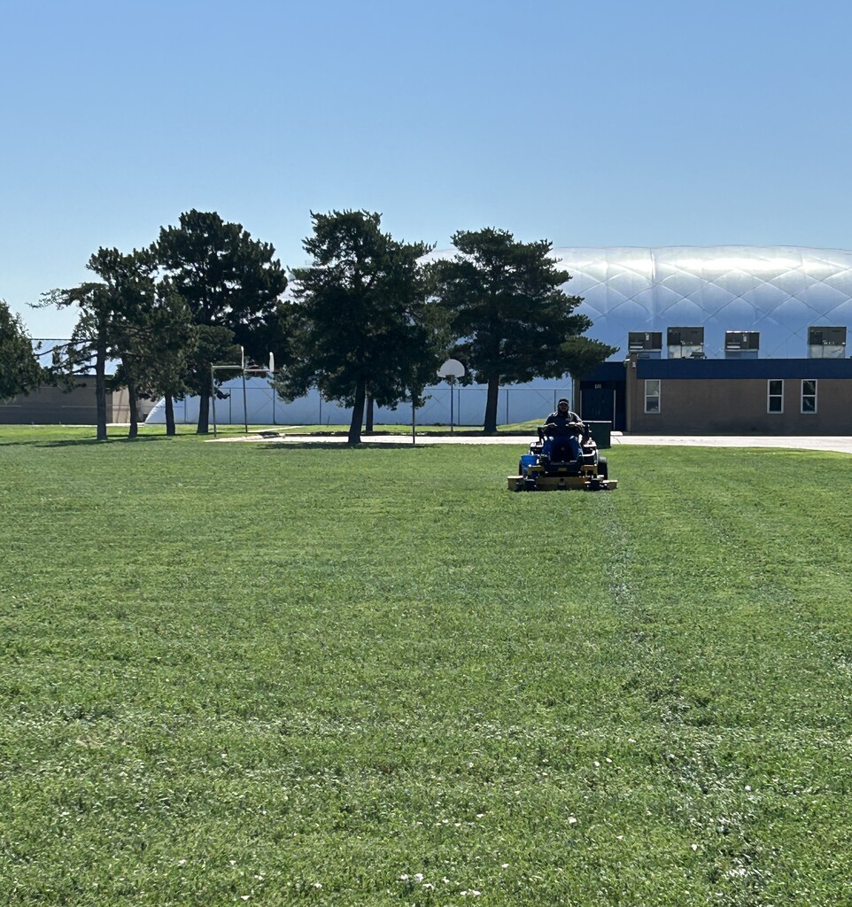 Grounds crew  mowing 