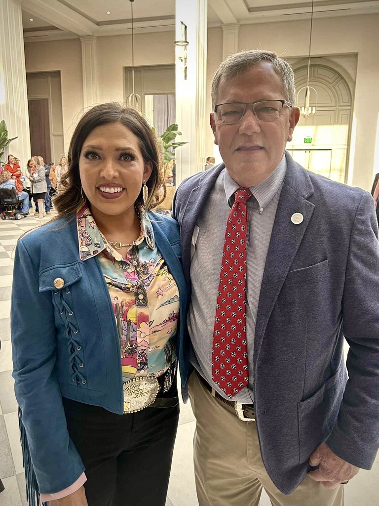 Lori Hoppe poses with Bill Newsom, the outgoing NAAE President.