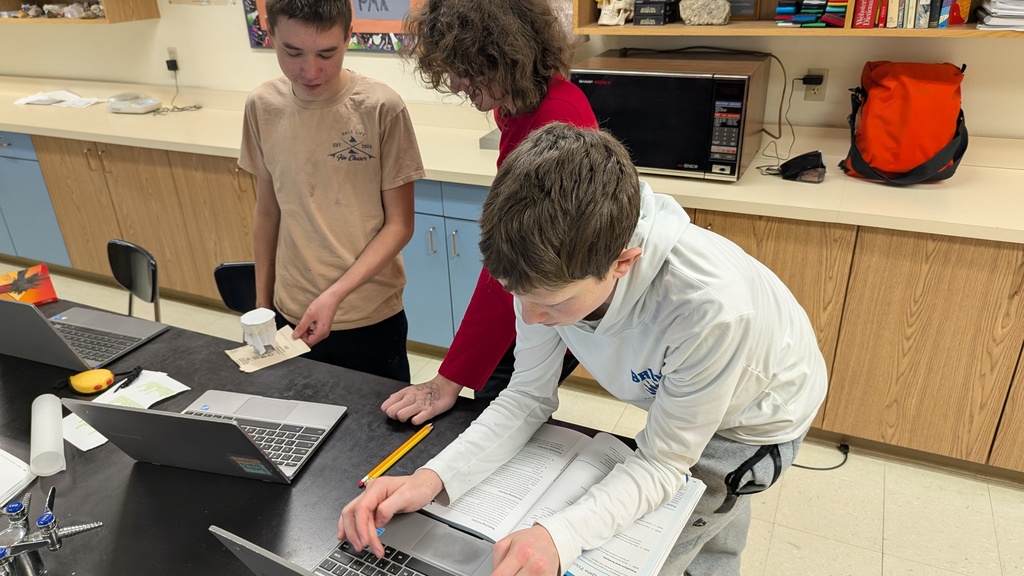 8th graders investigating friction