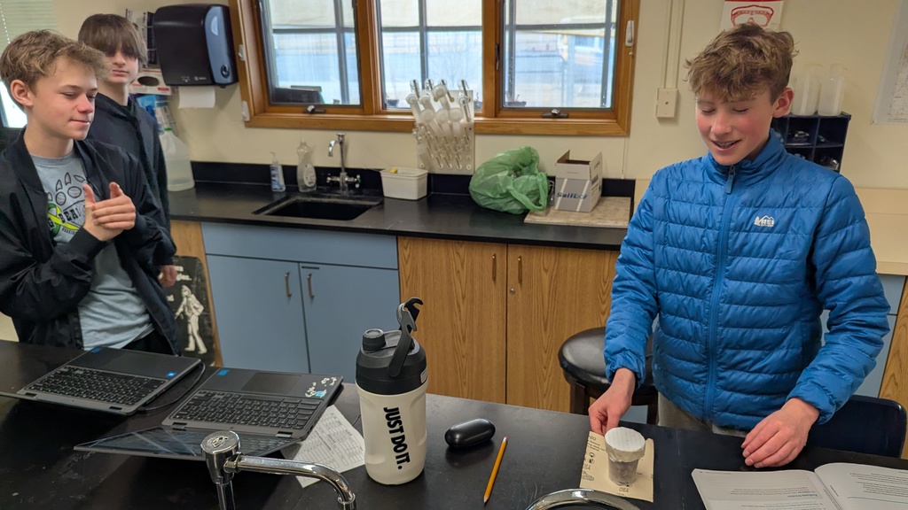 8th graders investigating friction