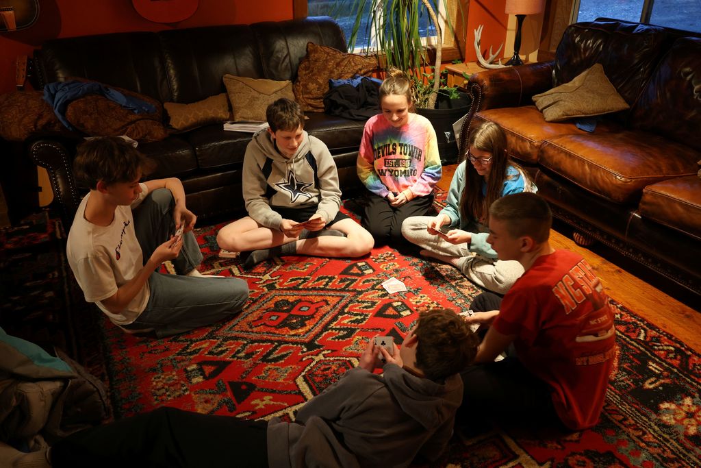 Students playing  games before dinner