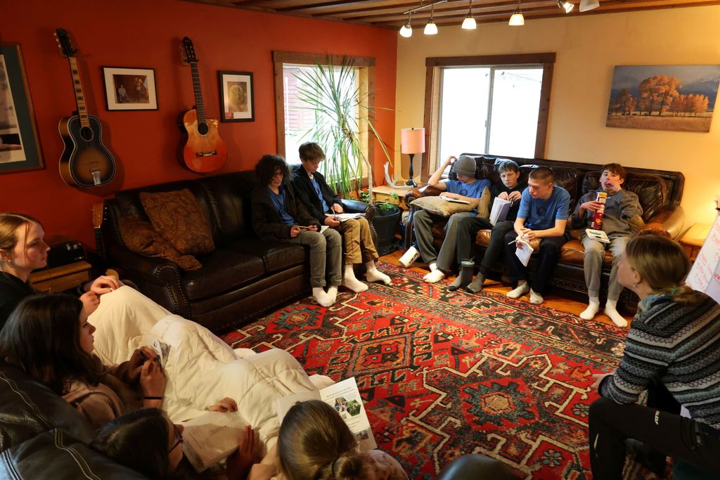 Students listening to a talk on scientific research