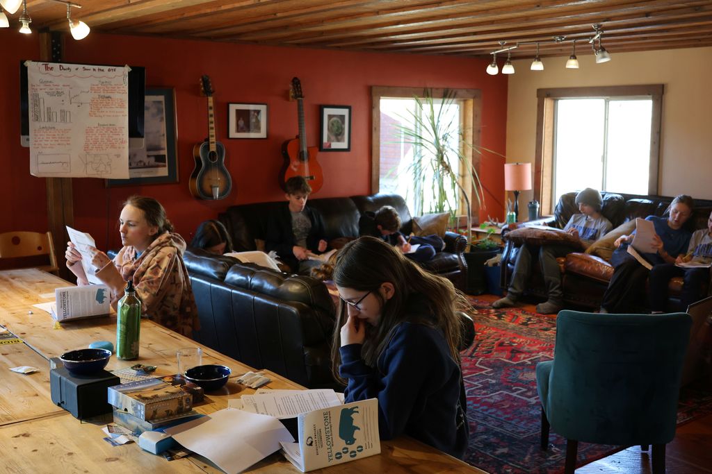 Students learning about the differing points of views on wolf conservation