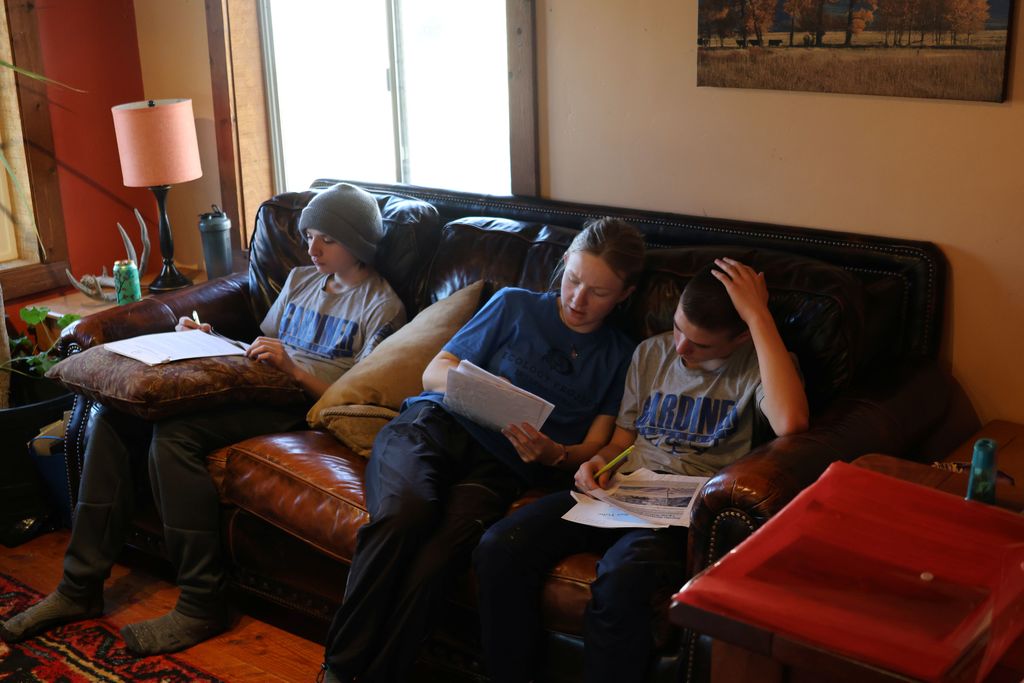 Students learning about the differing points of views on wolf conservation