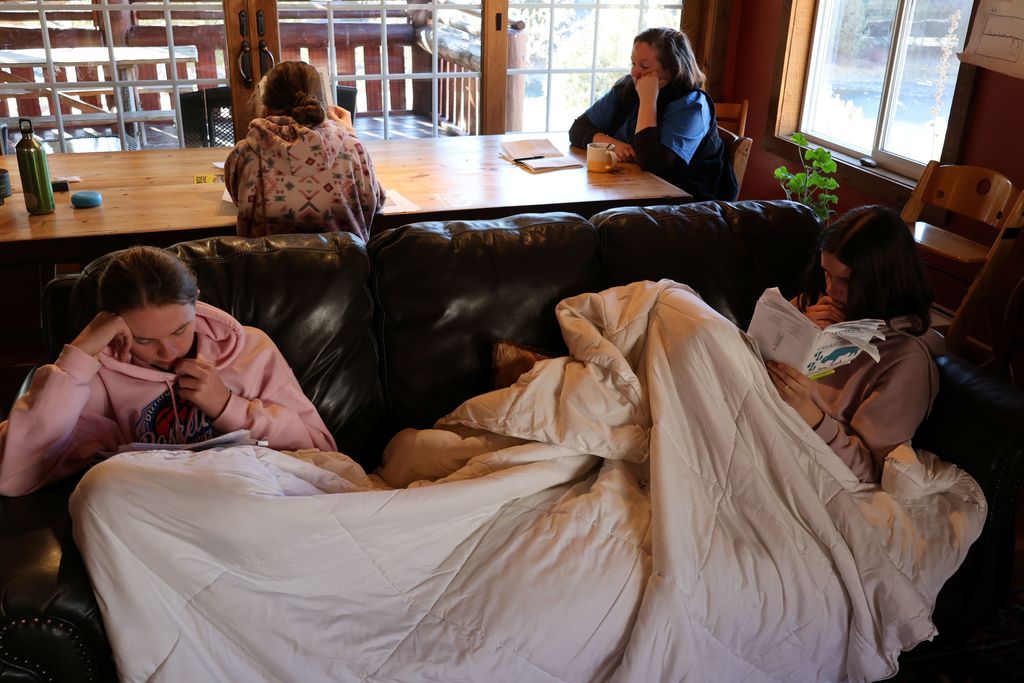 Students learning about the differing points of views on wolf conservation