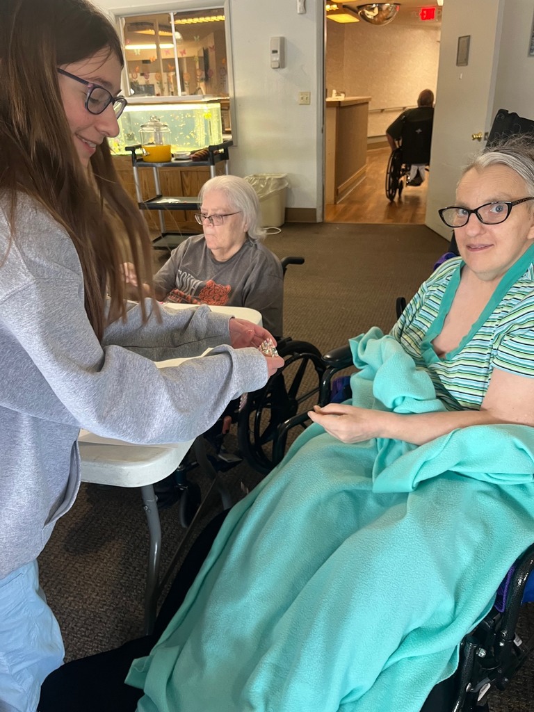 8th grader, Sasa, with resident, Dynette.